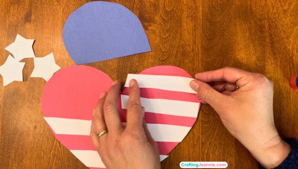Heart flag craft step two finish gluing on stripes