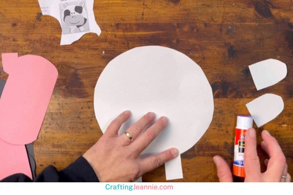 step one - glue legs to paper cow