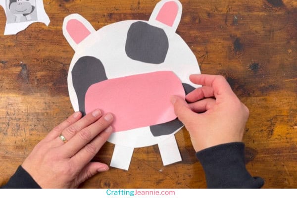 step five- glue pink snout to paper cow