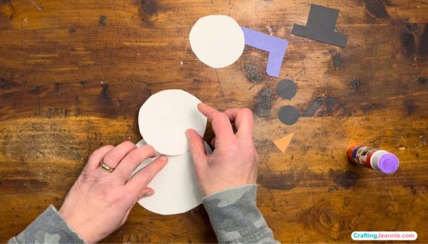 glue medium circle on top of biggest circle