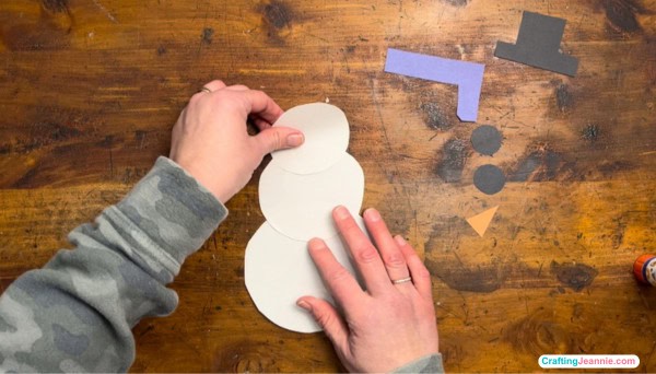 glue on snowman's head