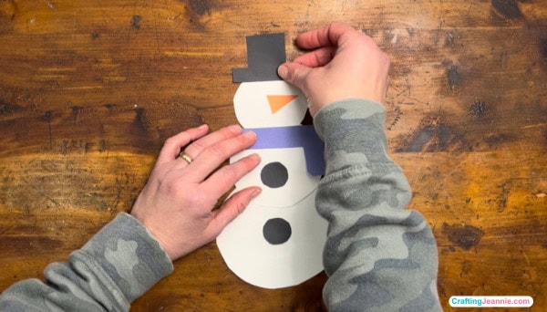 glue on the snowman's hat