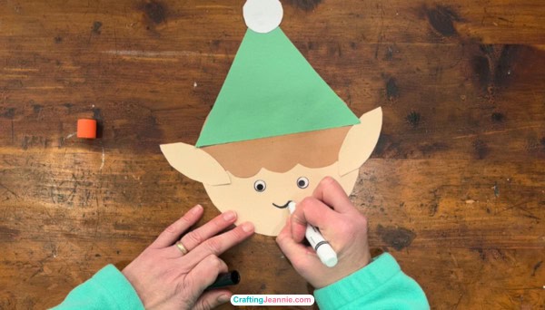 elf craft step six - draw a smile onto the face